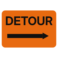 An orange rectangle with black lettering and a black arrow
